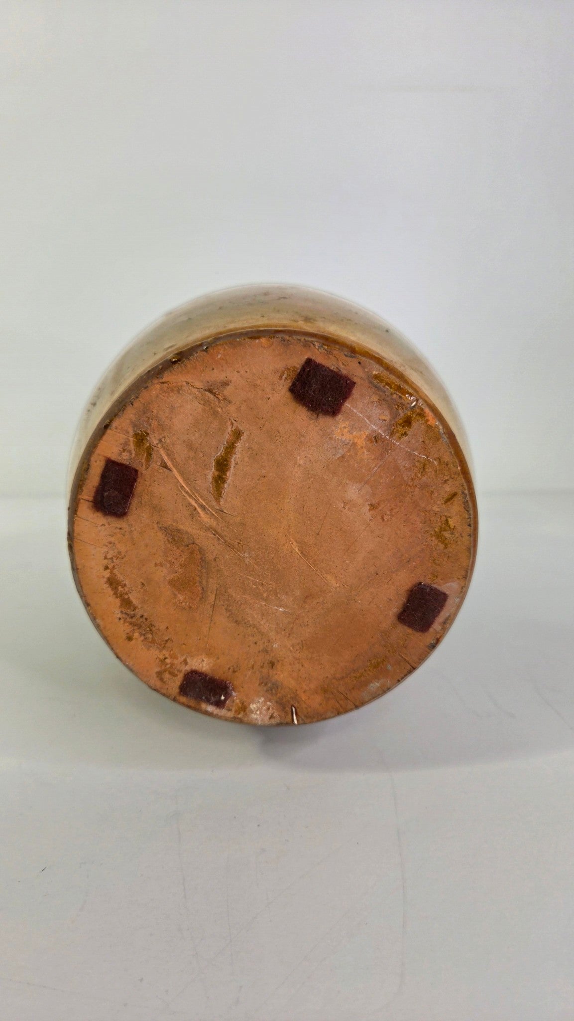 Oddly Darling Vintage ceramic jug base showing natural clay texture and protective felt pads for surface safety