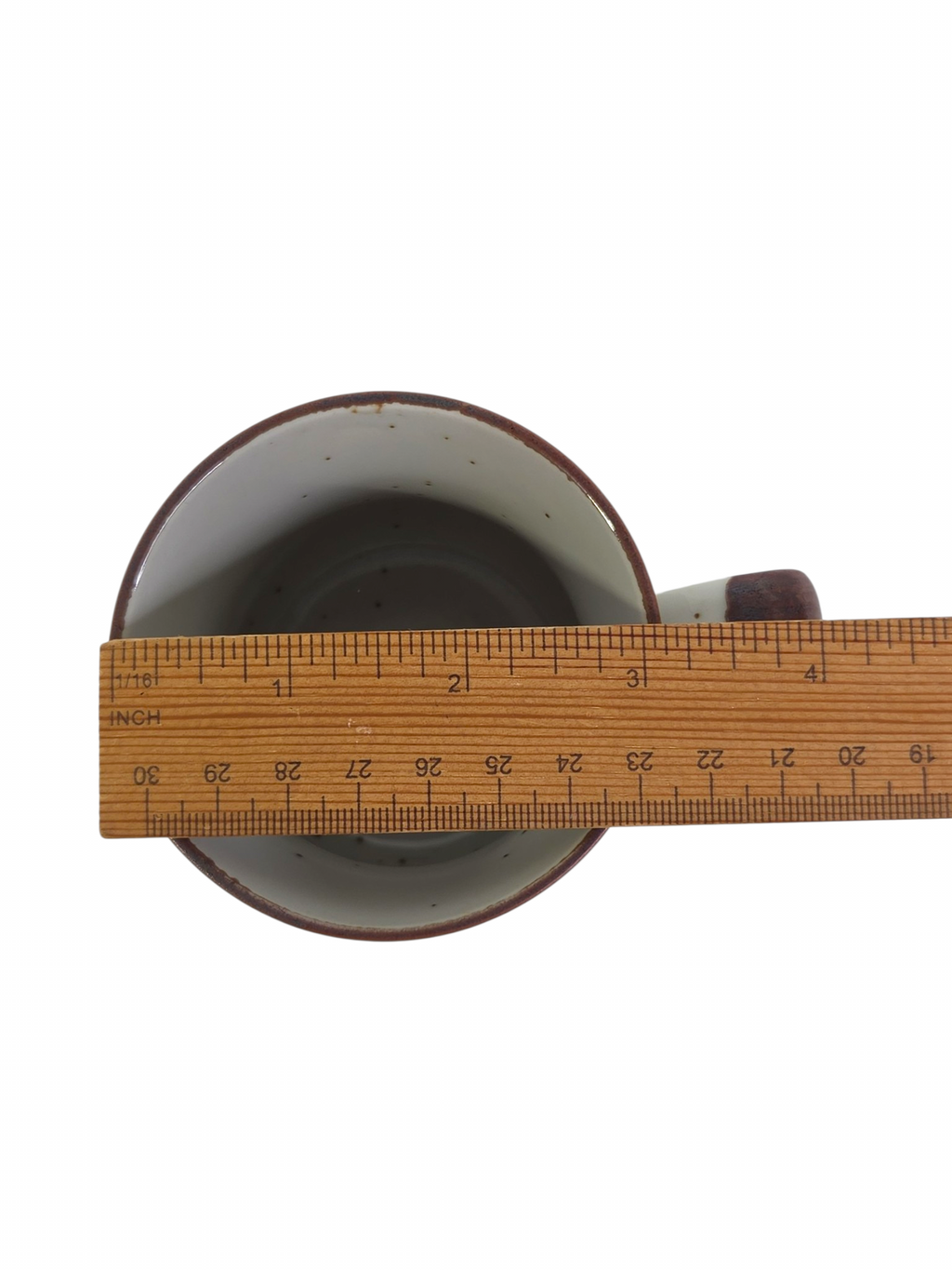 Oddly Darling Vintage ceramic coffee mug top view with a wooden ruler measuring the diameter