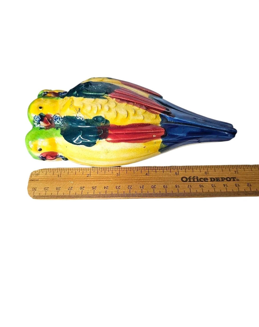 Oddly Darling Vintage ceramic parrot wall pocket planter with vibrant yellow, green, red, and blue glossy finish.