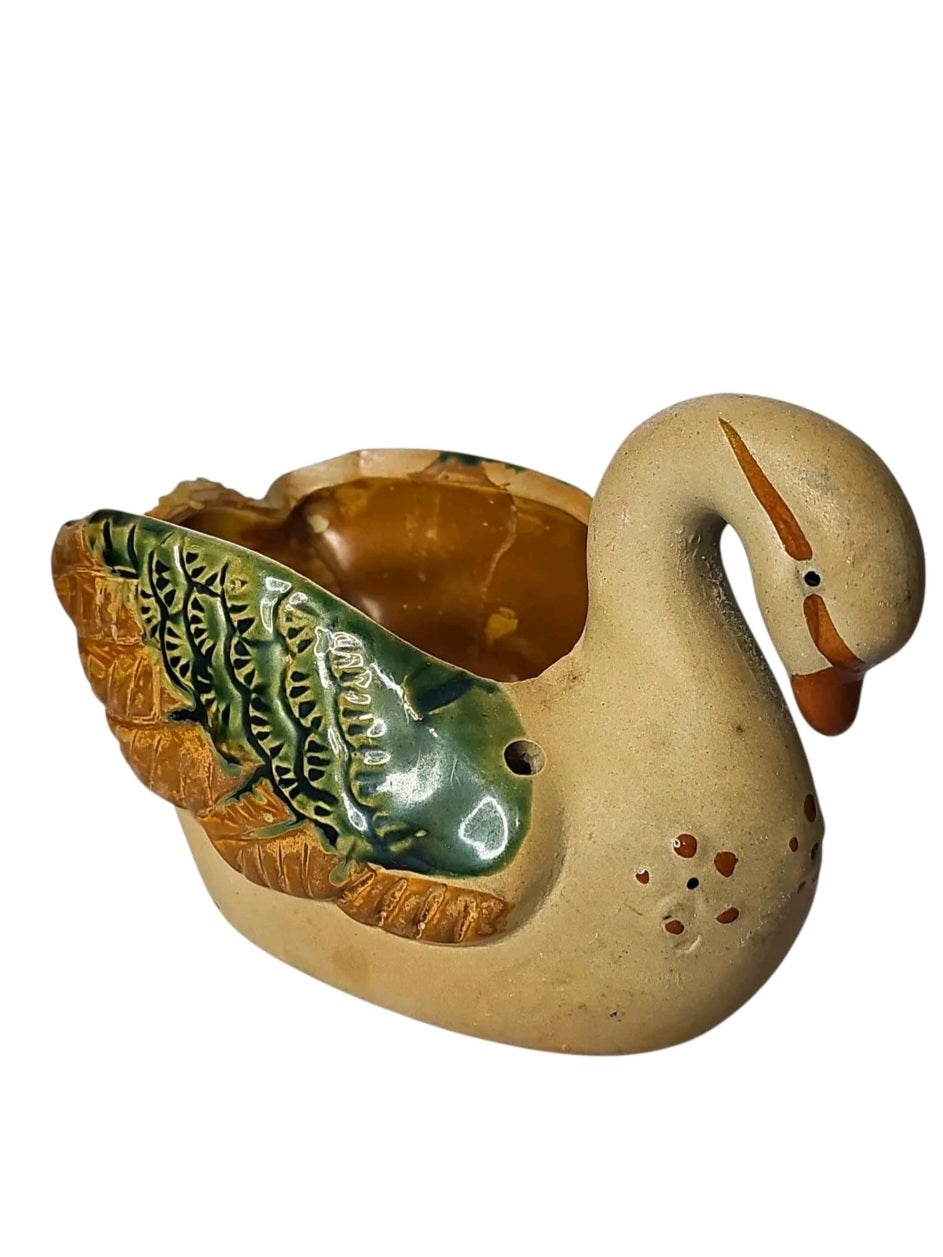 Oddly Darling Vintage ceramic swan planter with green and brown hand-painted wing details on a neutral base
