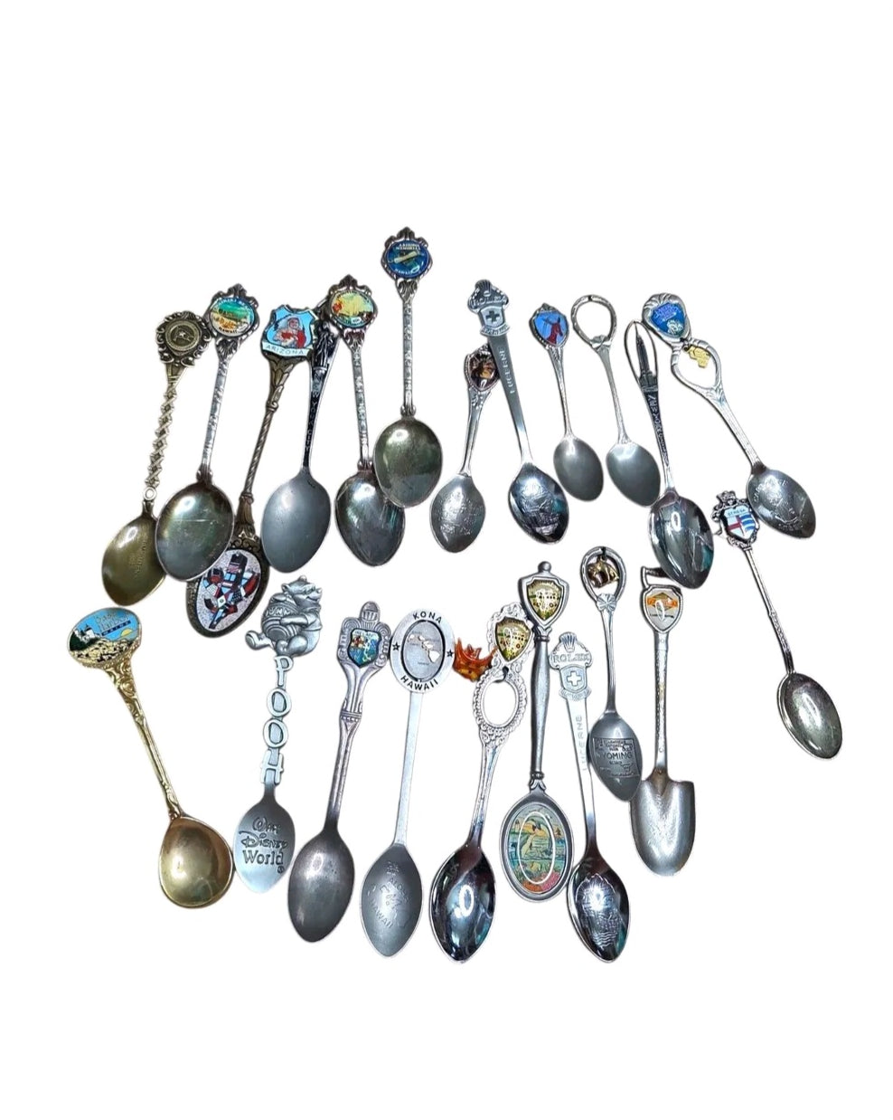 Oddly Darling Vintage collection of assorted souvenir spoons featuring travel landmarks, Disney themes, and enamel details
