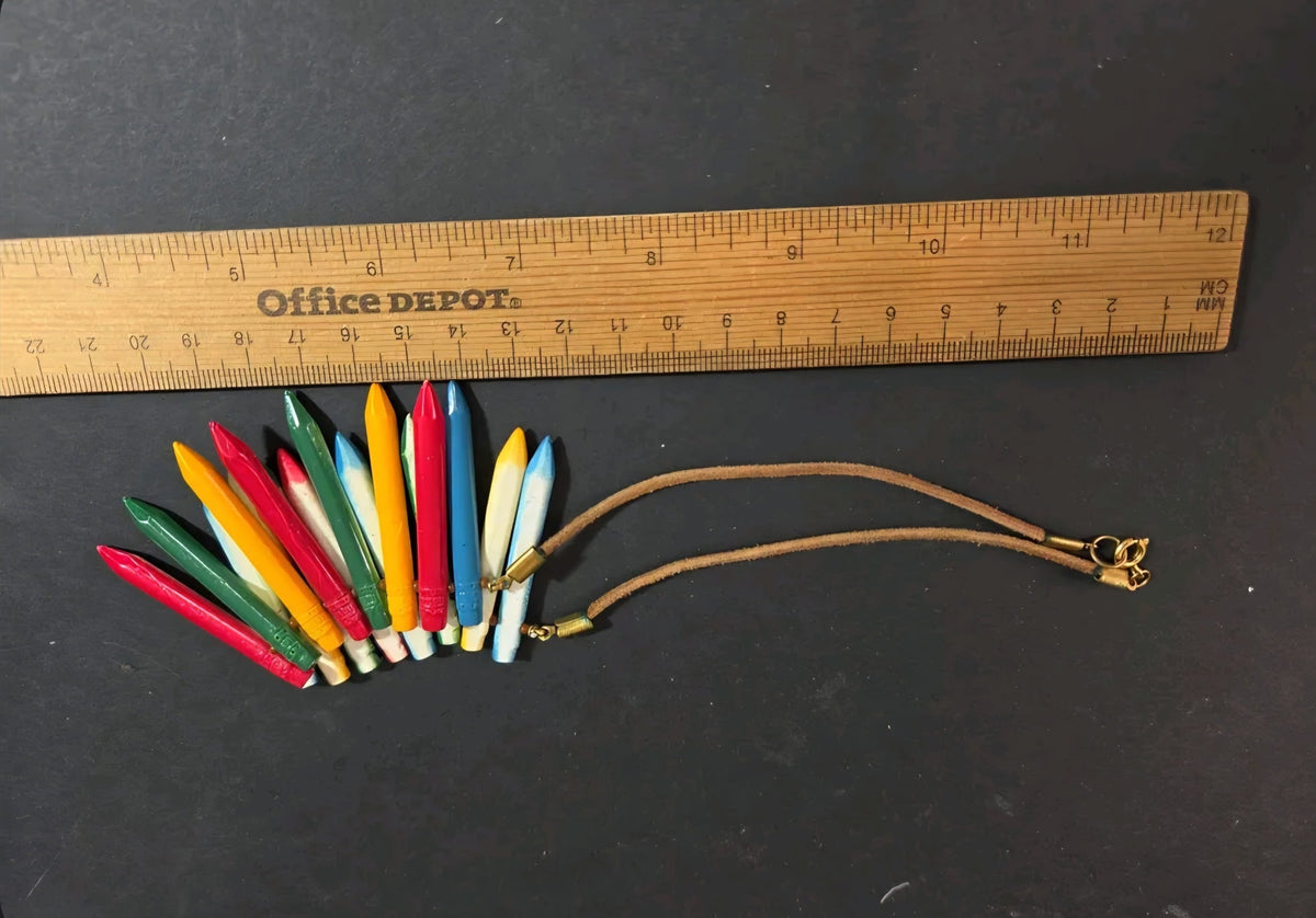 Oddly Darling Vintage crayon statement necklace with multi-colored pendants on a tan leather cord and gold hardware