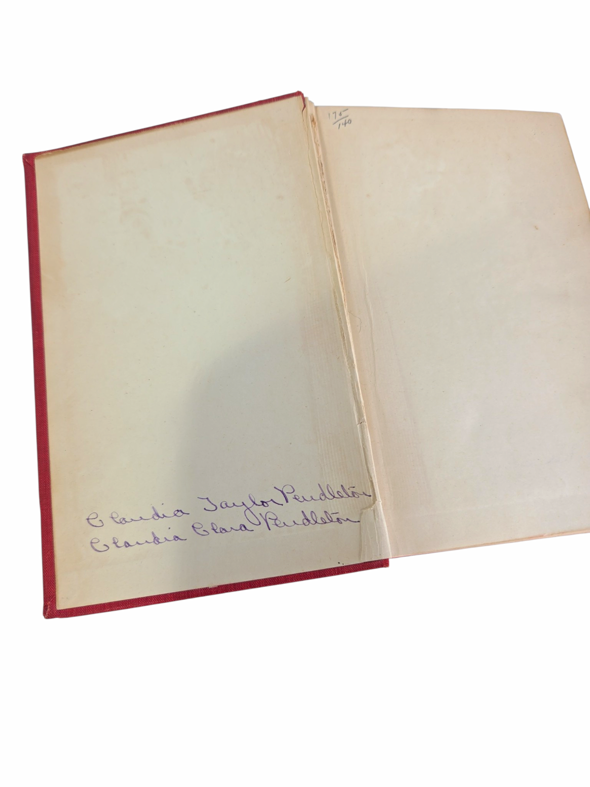 Oddly Darling Vintage Dariel book interior showing original endpapers with a handwritten inscription in ink