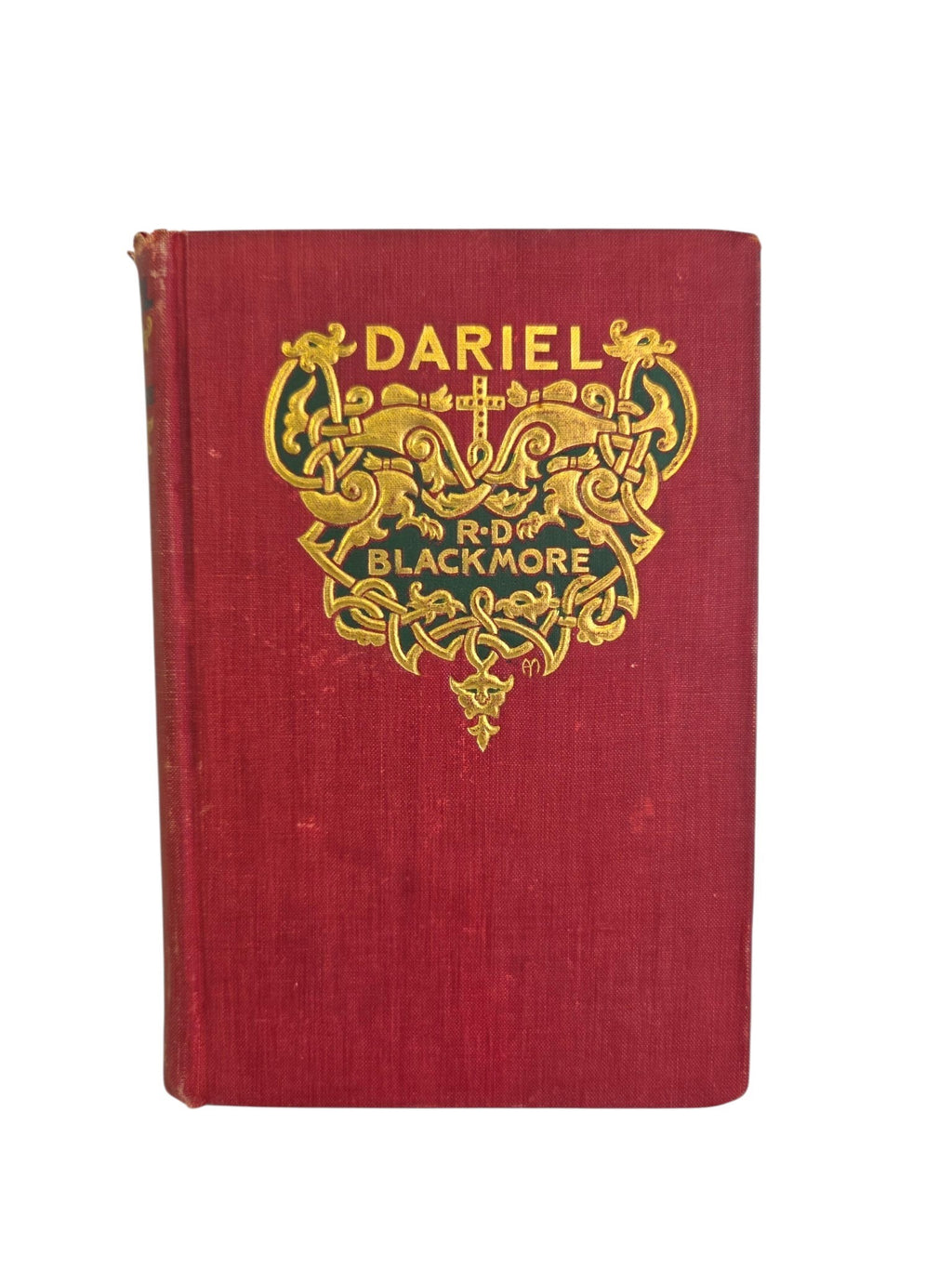Oddly Darling Vintage 1897 Dariel hardcover book with red cloth cover and ornate gold-embossed Victorian design.