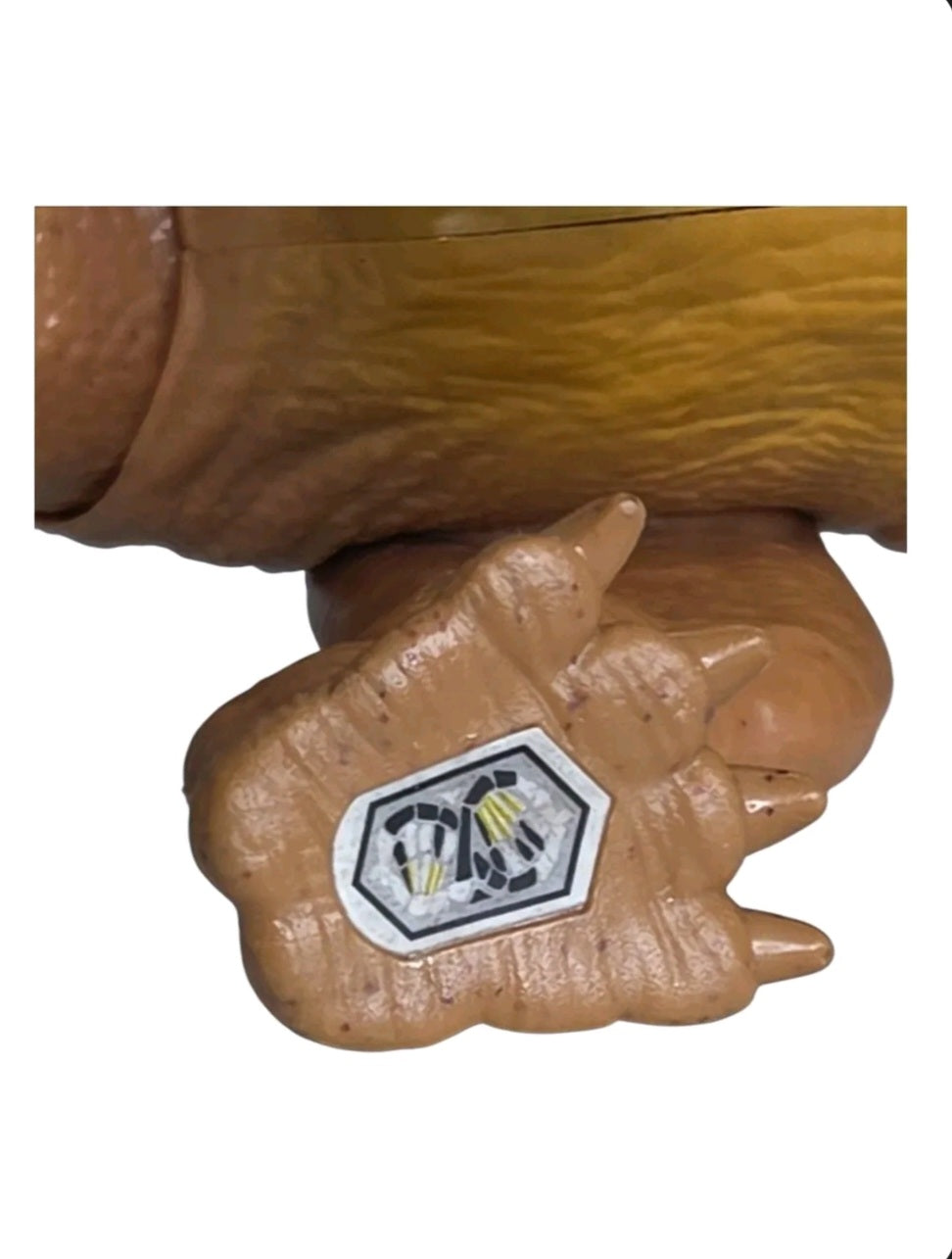 Close-up of the scannable code on the foot of the Jurassic World Pentaceratops figure