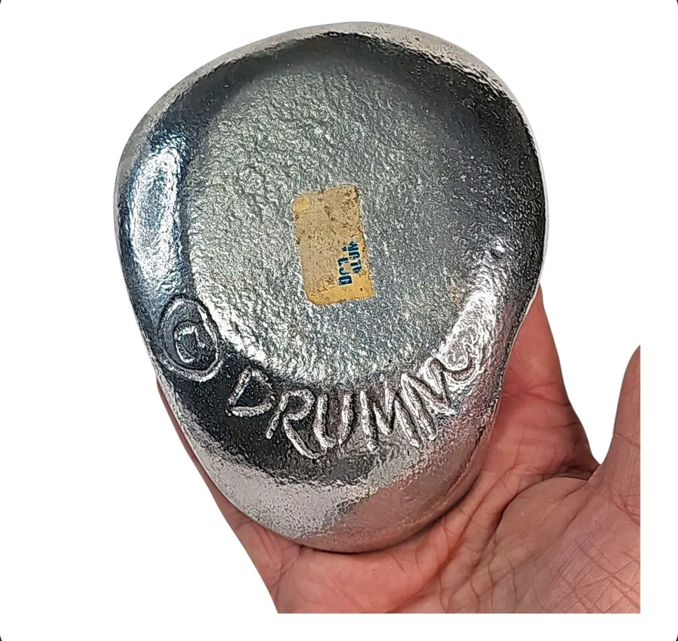 Back of Don Drumm cast aluminum cat trinket dish showing signed © DRUMM mark and original studio label