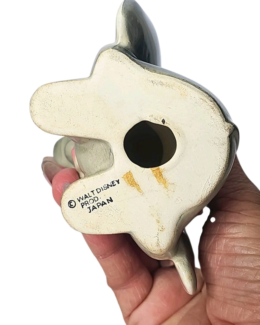 Oddly Darling Vintage Dumbo ceramic figurine base showing Walt Disney Productions Japan stamp held in a hand