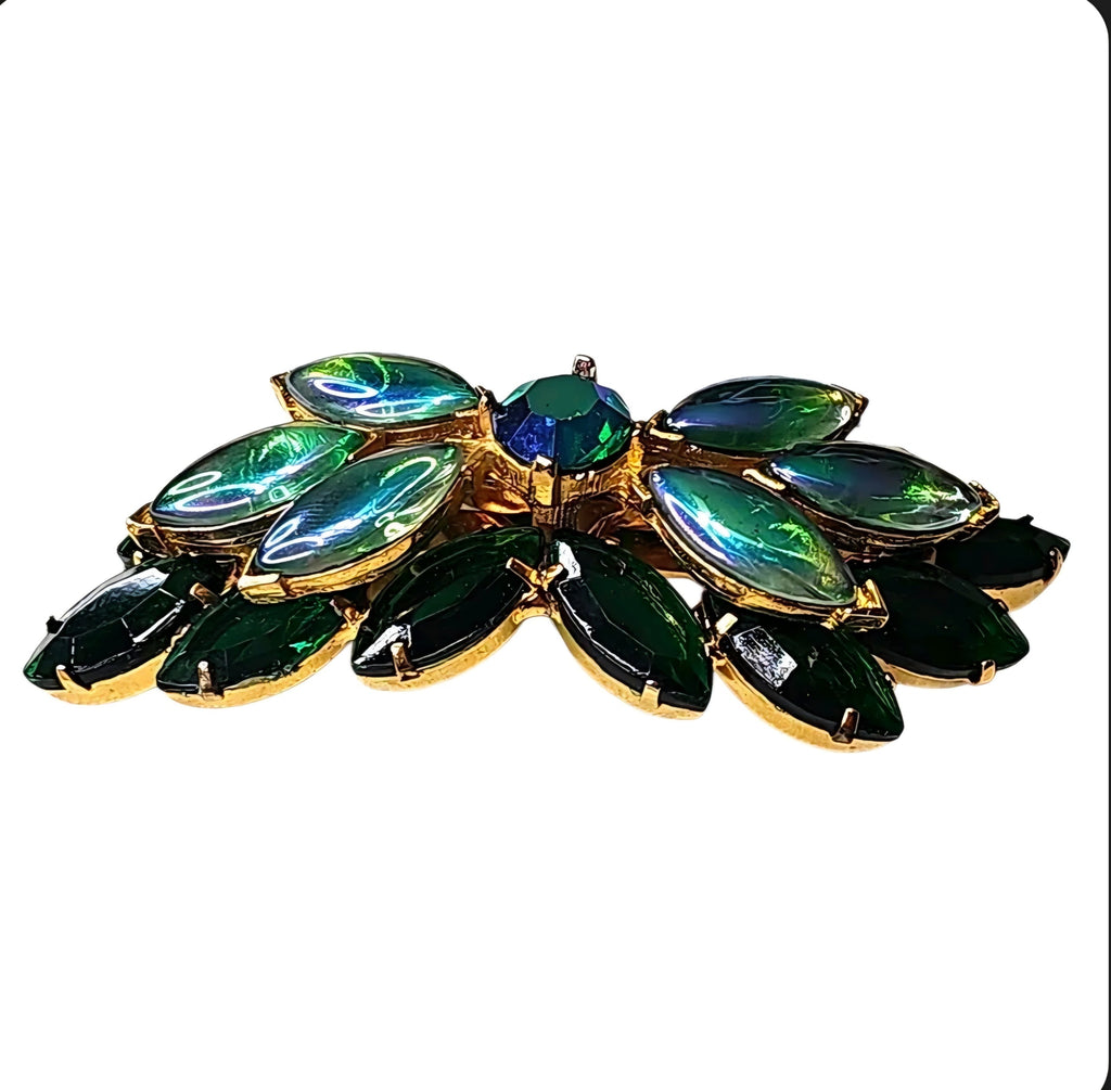 Oddly Darling Vintage brooch featuring emerald green marquise stones and iridescent accents in a gold-tone setting.