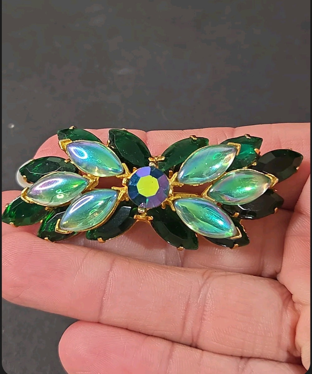 Oddly Darling Vintage emerald green and iridescent marquise stone brooch in a gold-tone botanical leaf design.