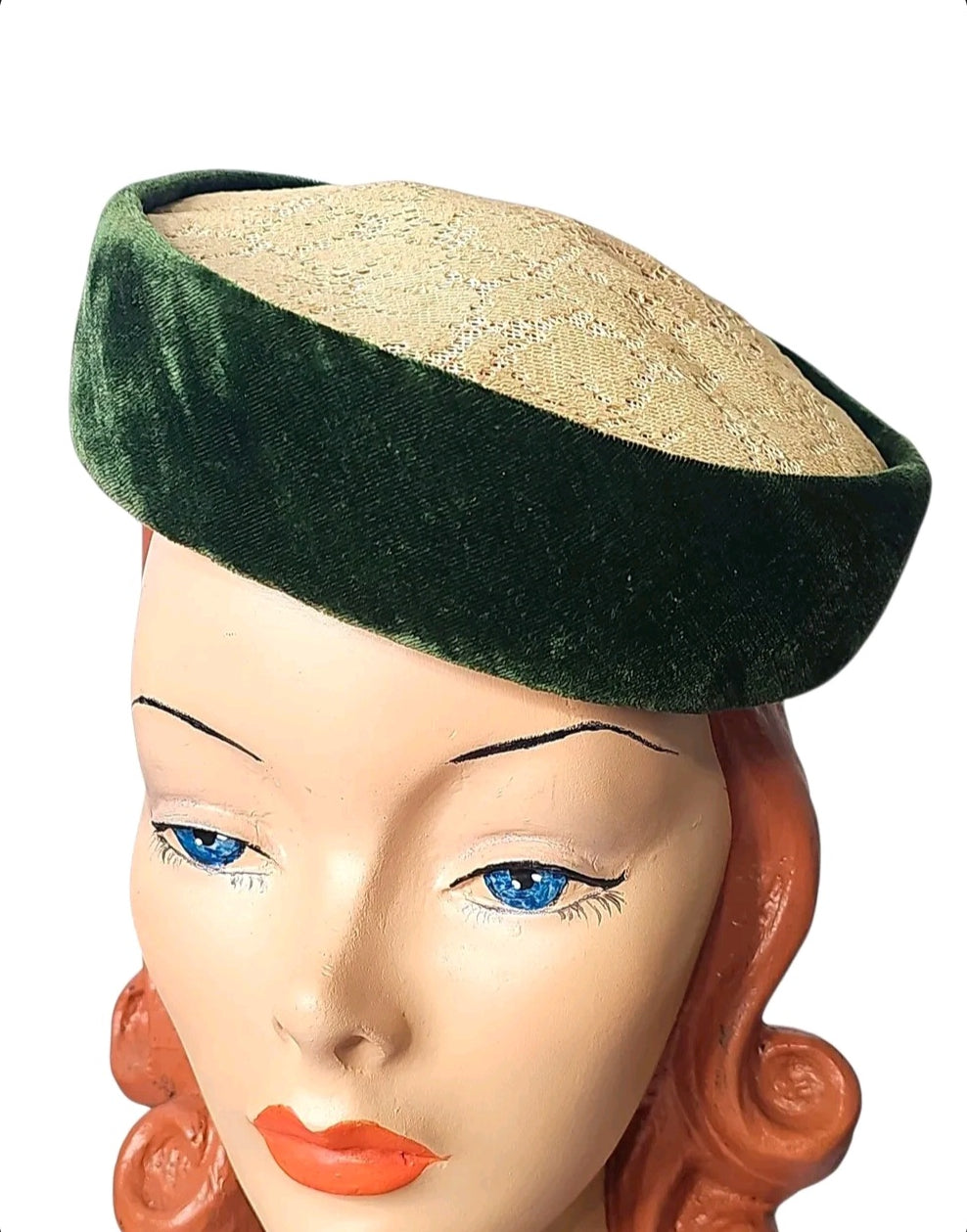 Oddly Darling Vintage pillbox hat featuring a deep emerald green velvet band and a textured cream lace crown.