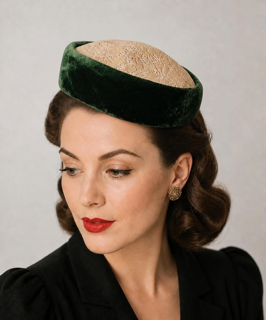 Oddly Darling Vintage pillbox hat with emerald green velvet trim and cream lace crown worn by a woman with retro hair