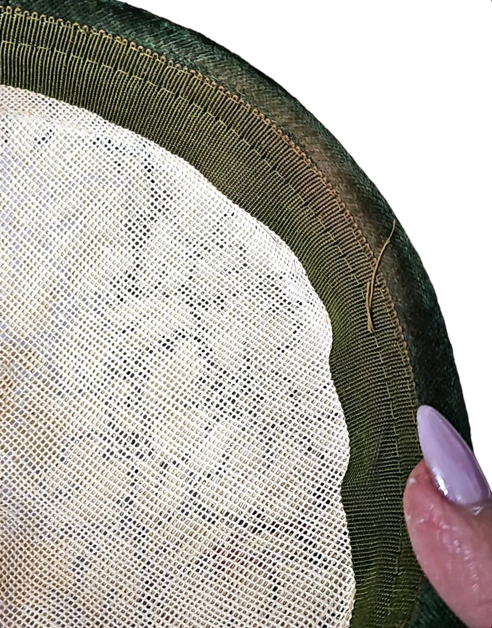 Oddly Darling Vintage pillbox hat featuring a cream lace crown and a deep emerald green velvet trim detail
