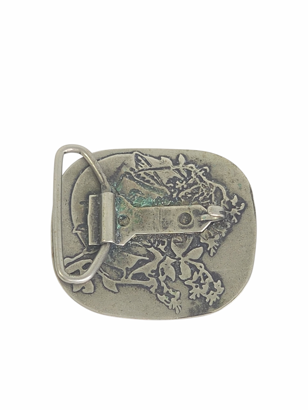 Oddly Darling Vintage silver-toned belt buckle featuring an intricate embossed fairy and foliage design on the back.