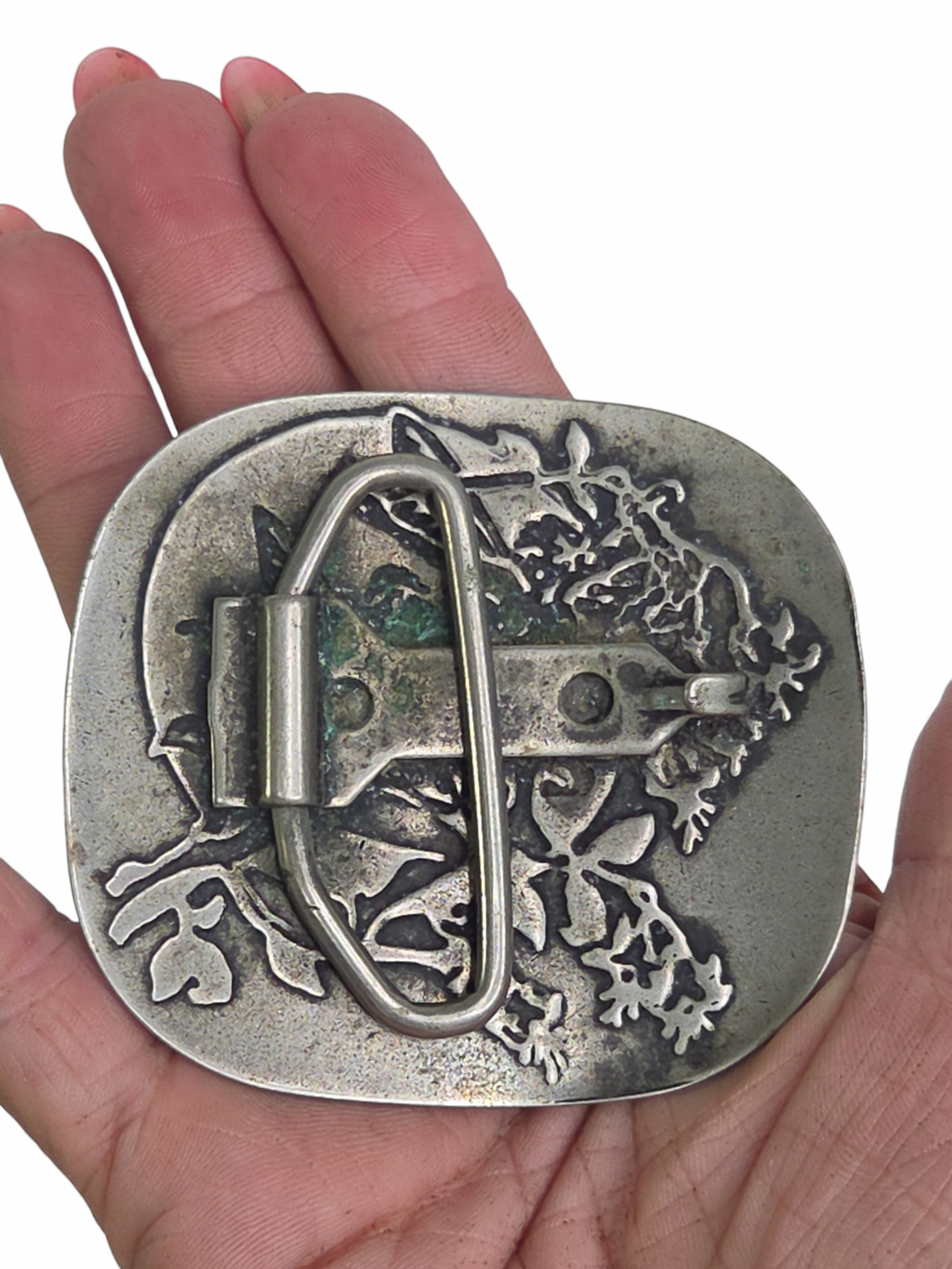Oddly Darling Vintage silver-toned belt buckle featuring an intricate embossed fairy and foliage design