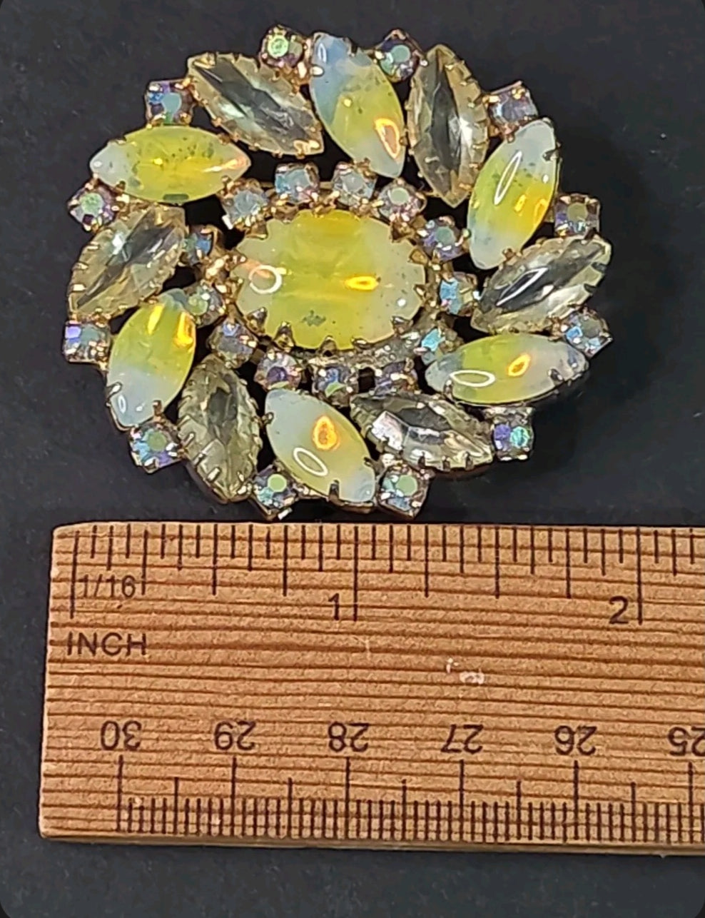 Oddly Darling Vintage floral brooch with iridescent marquise stones, central cabochon, and gold-tone setting.