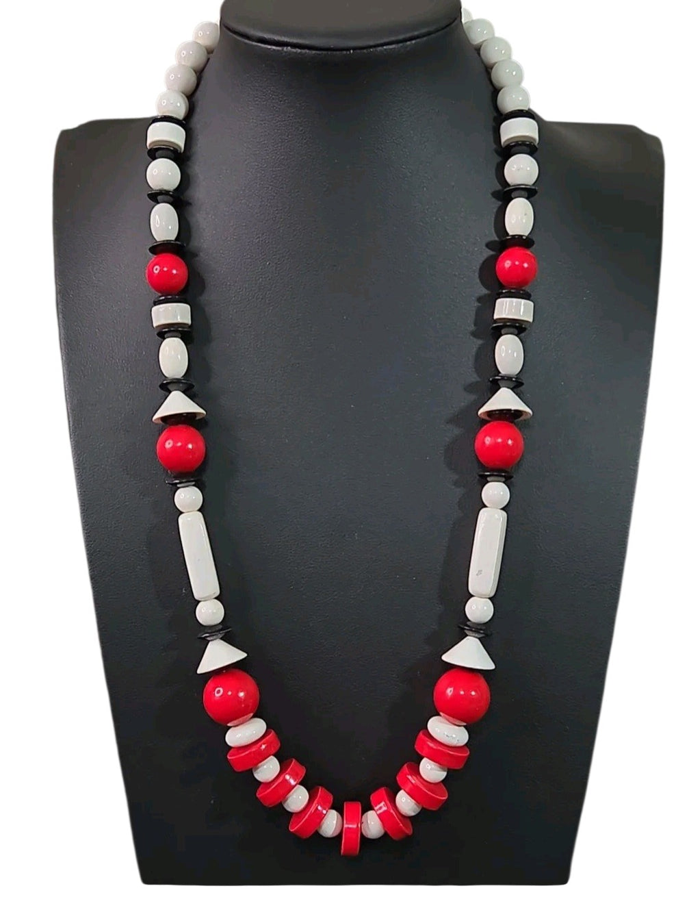 Oddly Darling Vintage geometric statement necklace featuring red, white, and black beads in sphere and disc shapes.