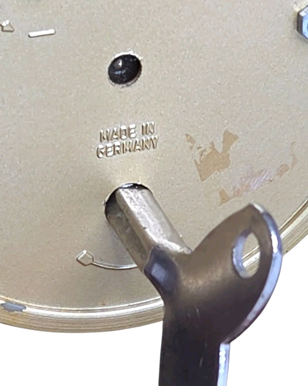 Oddly Darling Vintage mantel clock back view showing the metal winding key and Made in Germany stamp on the casing.