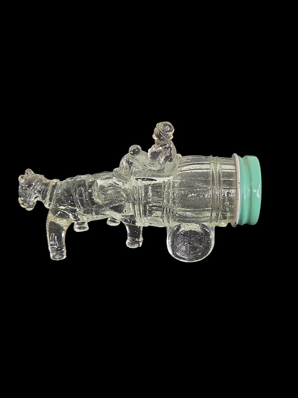 Oddly Darling Vintage clear glass horse and cart decorative bottle with a light green screw-top lid.