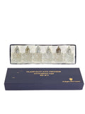 Oddly Darling Vintage set of six cut-glass salt and pepper shakers with silver-plated lids in a presentation box.