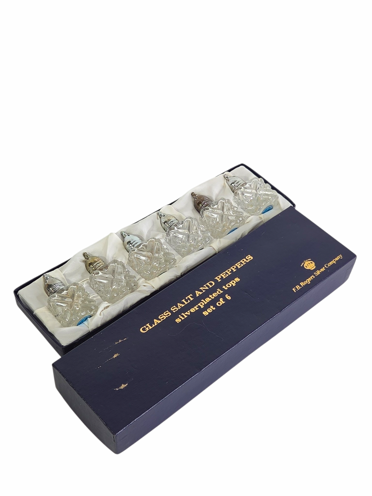 Oddly Darling Vintage set of six F.B. Rogers Silver Company cut-glass salt and pepper shakers with silver-plated lids.