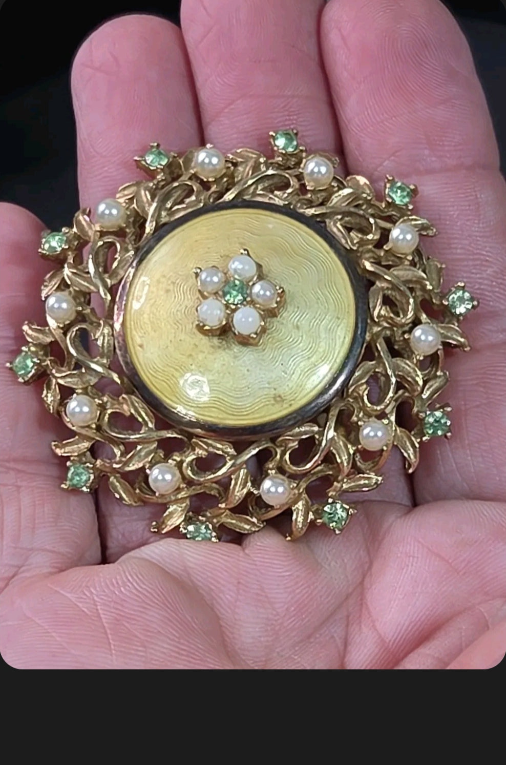Oddly Darling Vintage gold-tone brooch with guilloché enamel, faux pearls, and green rhinestones in a floral design.