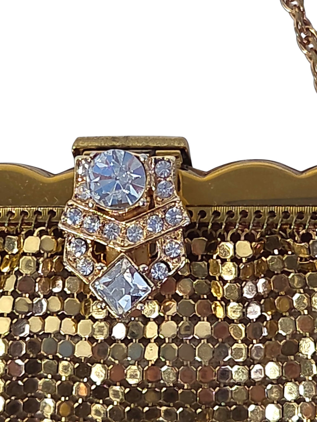 Close-up of the Art Deco style clasp with a large round rhinestone, a square-cut stone and a chevron of small clear stones