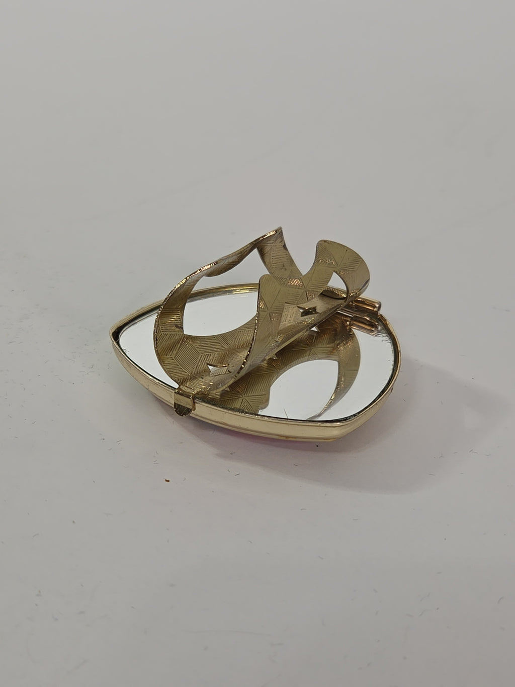 Oddly Darling Vintage gold-tone triangular ring with a functional mirror lid and textured geometric band.