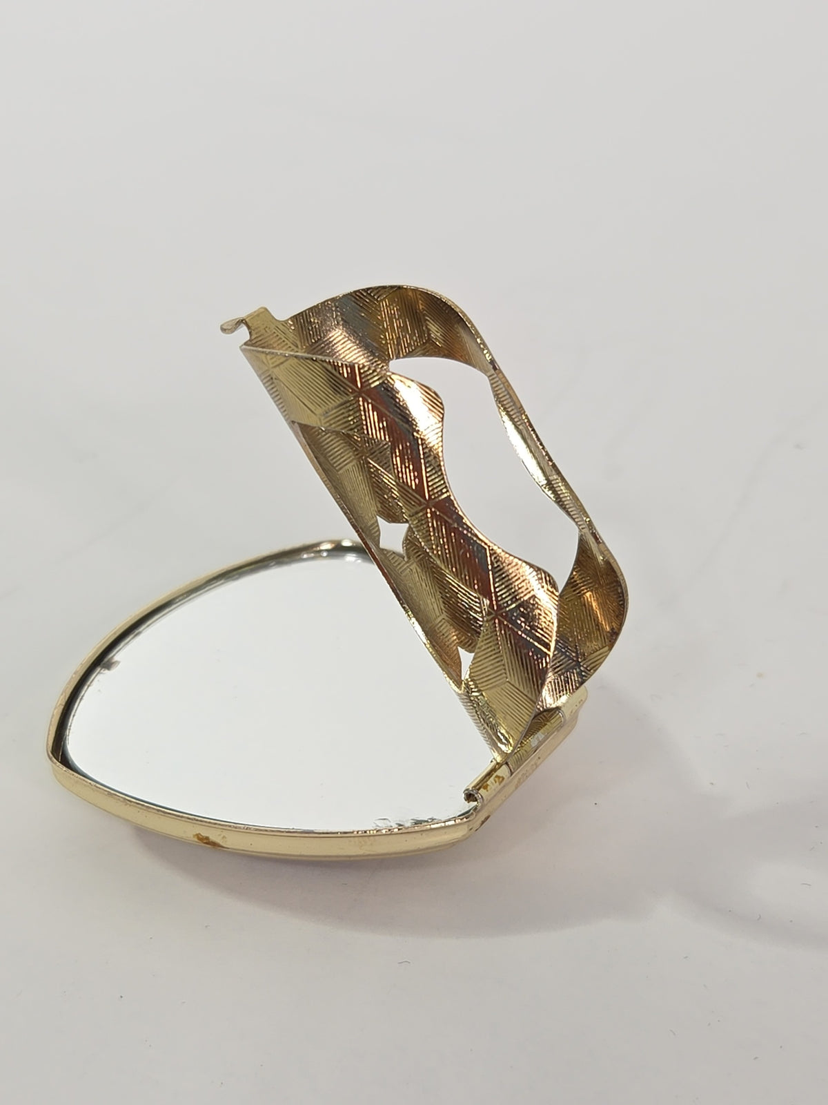 Oddly Darling Vintage gold-tone triangular ring compact with an open-work textured band and a functional mirror lid