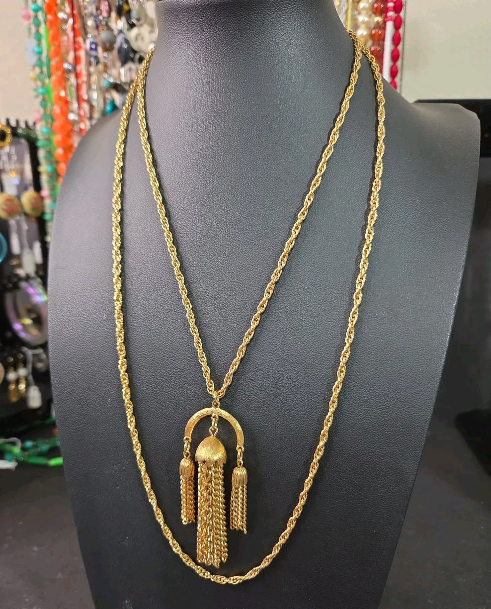 Oddly Darling Vintage gold-tone long rope chain necklace with an arch pendant and cascading chain tassels.