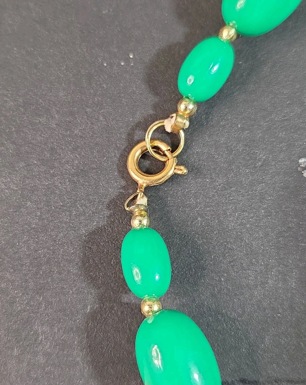 Oddly Darling Vintage emerald green oval bead necklace with gold-tone spring ring clasp and small spacer beads