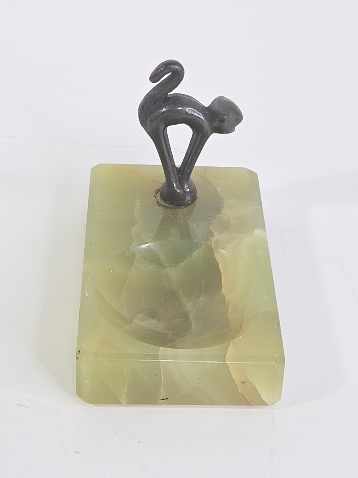 Oddly Darling Vintage green onyx trinket tray with a whimsical dark metal cat figurine in an arching pose
