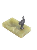 Oddly Darling Vintage green onyx trinket tray with a dark metal cat figurine in a playful arching pose.