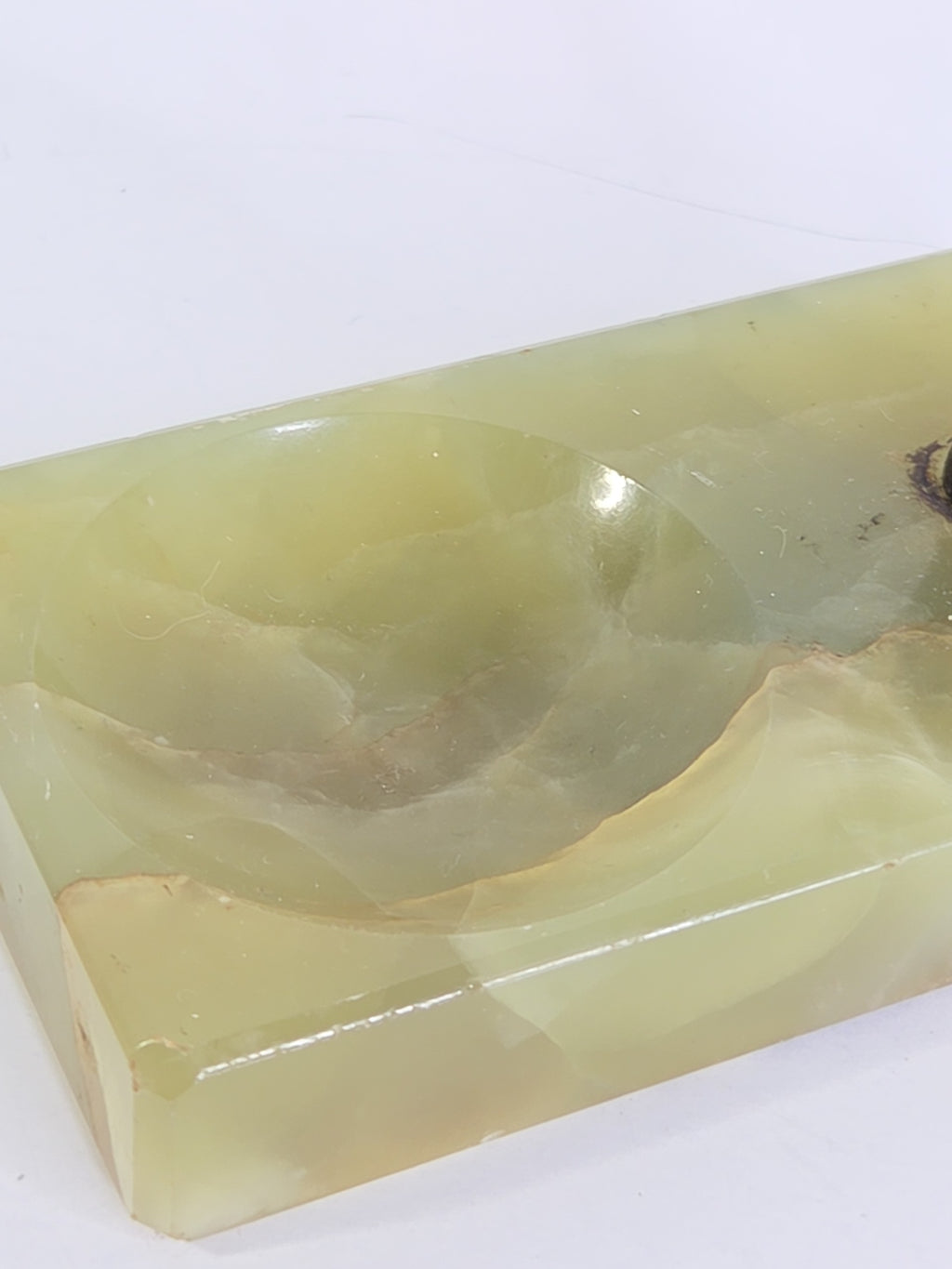 Oddly Darling Vintage green onyx trinket tray with a polished rectangular base and a circular indentation