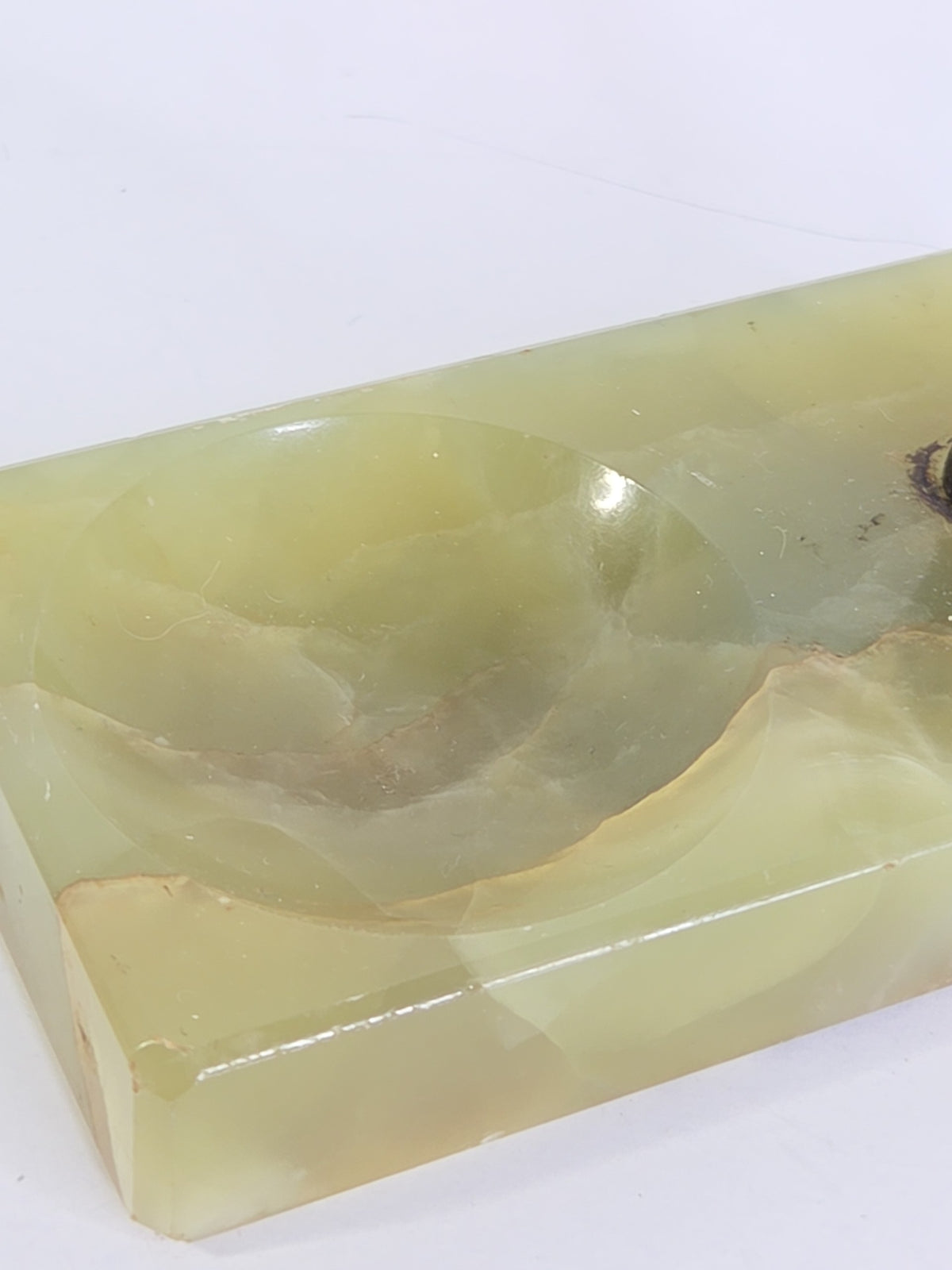 Oddly Darling Vintage green onyx trinket tray with a polished rectangular base and a circular indentation