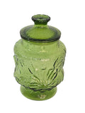 Vintage Anchor Hocking Rain Flower canister in avocado green glass with a flower knob lid