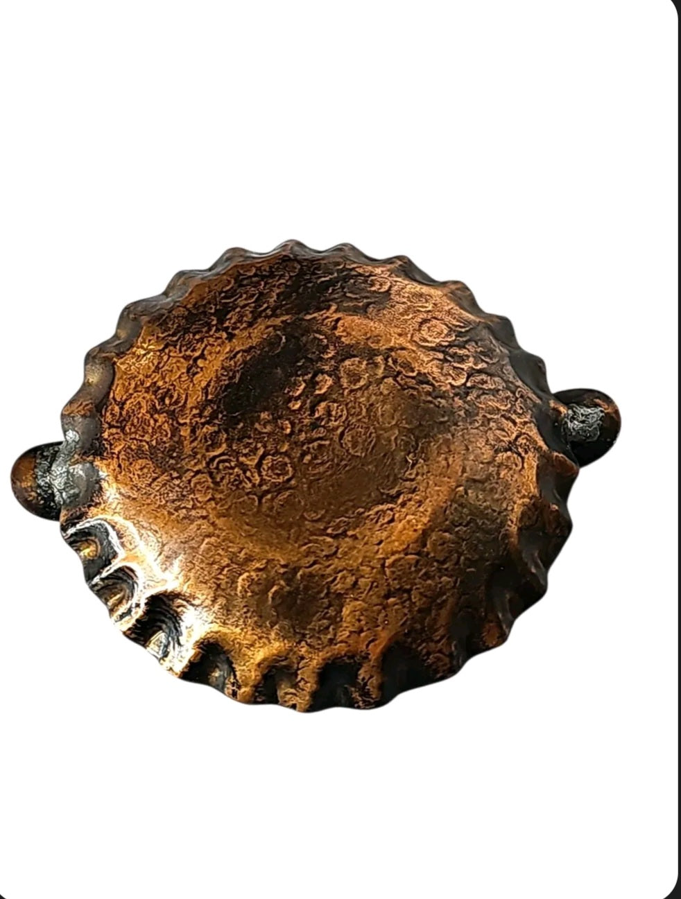 Oddly Darling Vintage hand-hammered copper ashtray with a rustic patina and scalloped edges