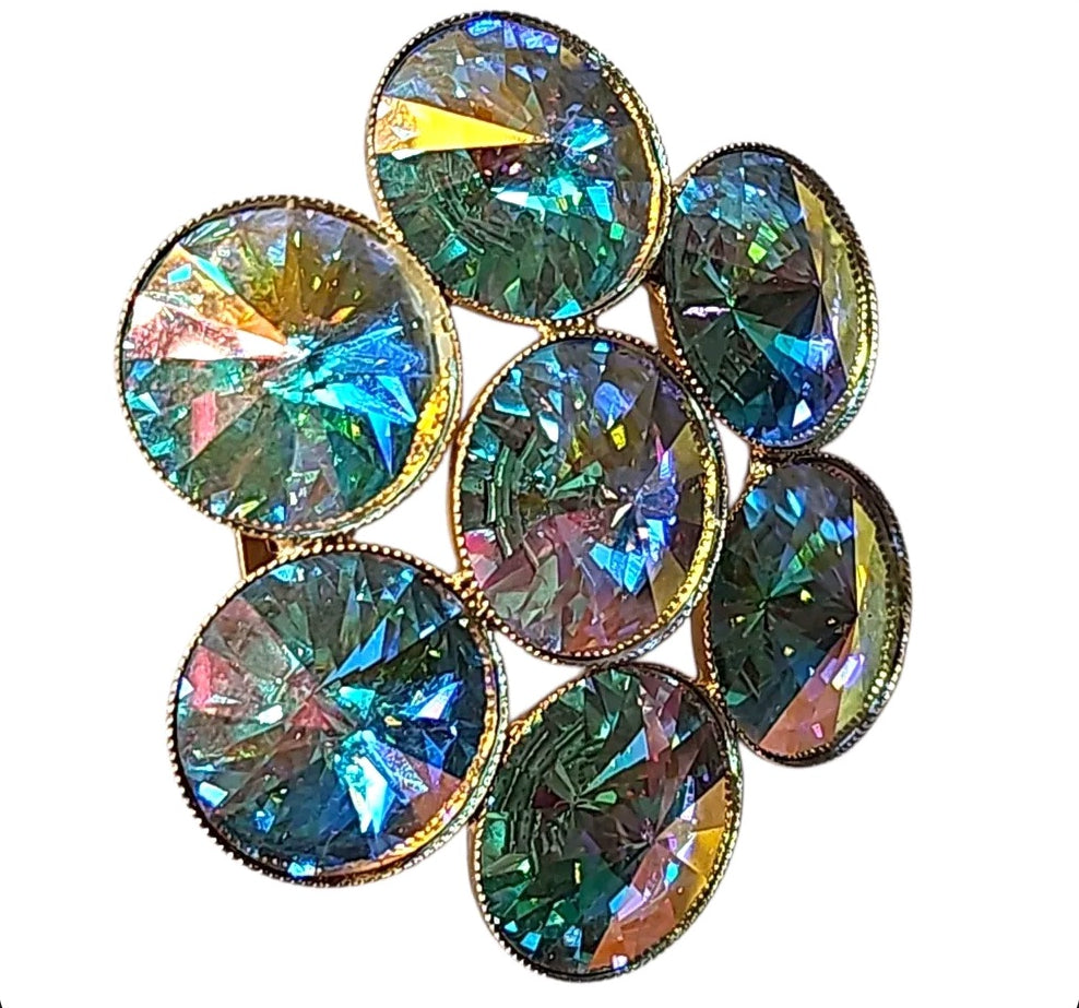 Oddly Darling Vintage floral cluster brooch with iridescent teal and gold crystals in a polished gold-tone setting.