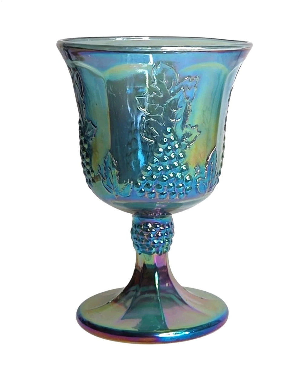 Oddly Darling Vintage iridescent blue carnival glass goblet featuring an embossed grape and vine motif.