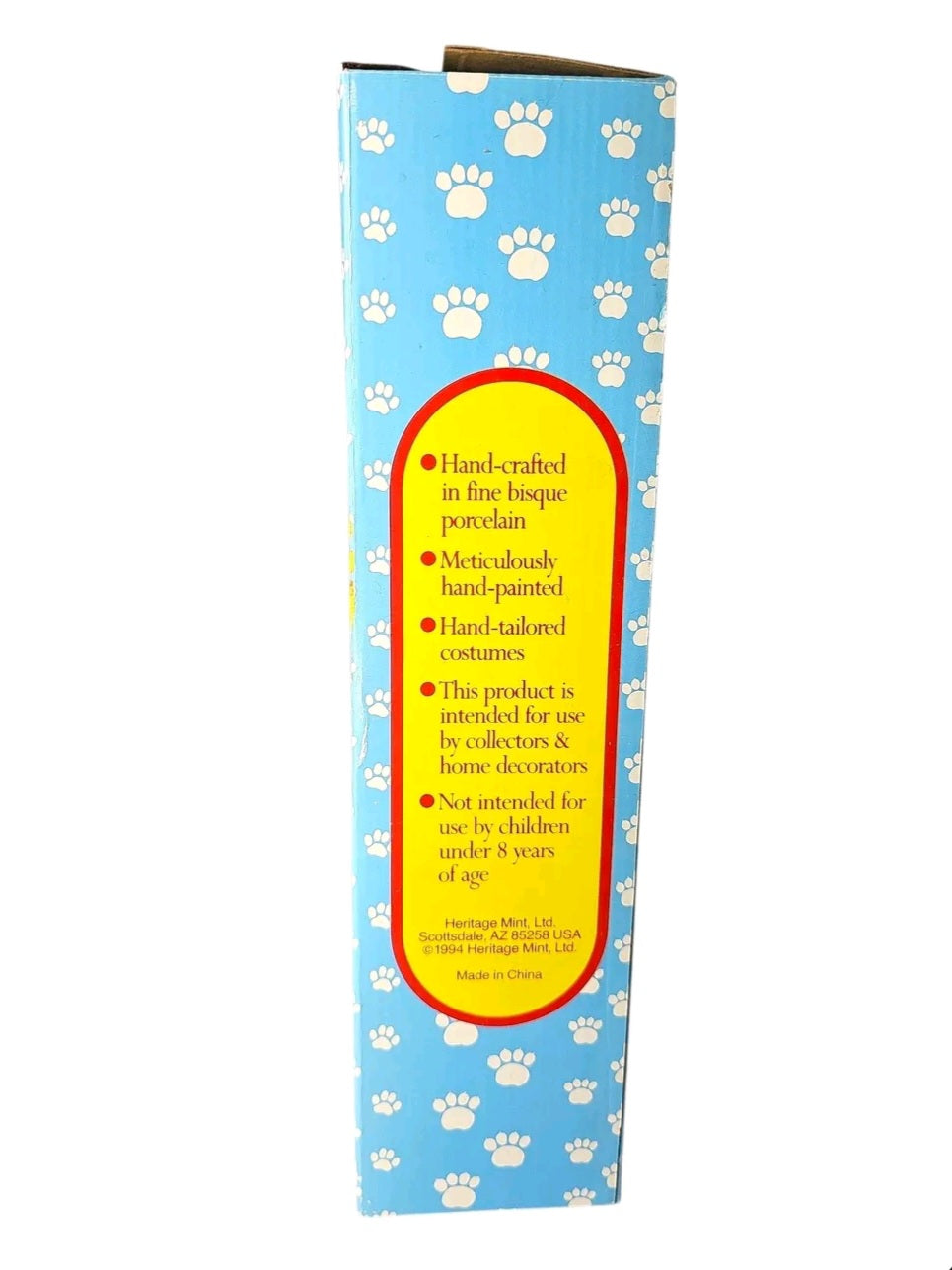 Oddly Darling Vintage King Meow porcelain doll packaging side panel with product details and paw print pattern