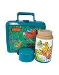 Oddly Darling Vintage 90s Disney The Lion King teal plastic lunchbox and matching thermos with Simba, Timon, and Pumbaa.