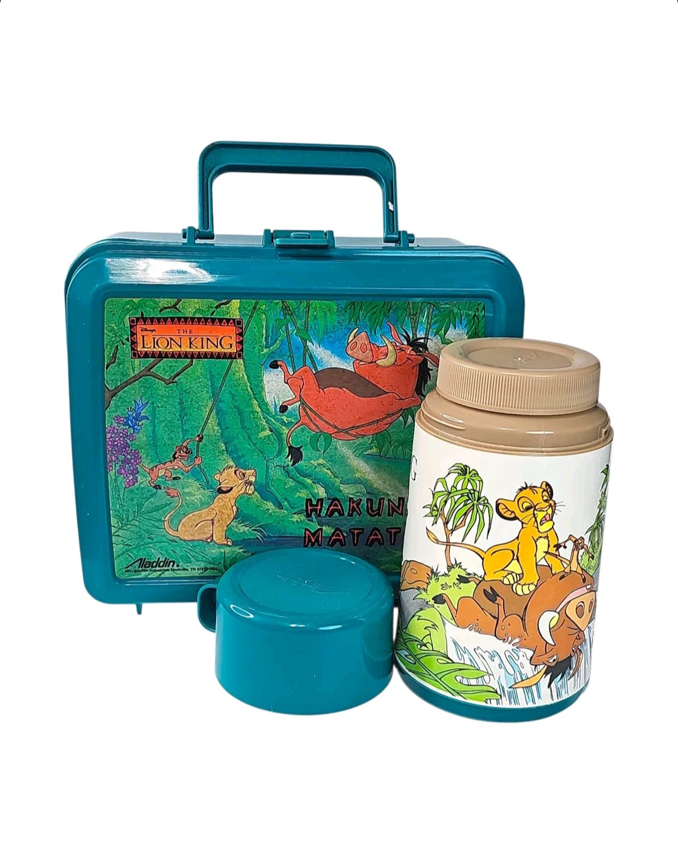 Oddly Darling Vintage 90s Disney The Lion King teal plastic lunchbox and matching thermos with Simba, Timon, and Pumbaa.