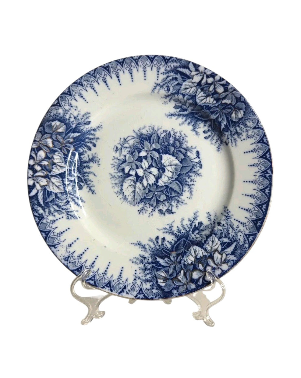 Oddly Darling Vintage Lunéville ceramic plate featuring a blue floral transferware pattern on an off-white background.