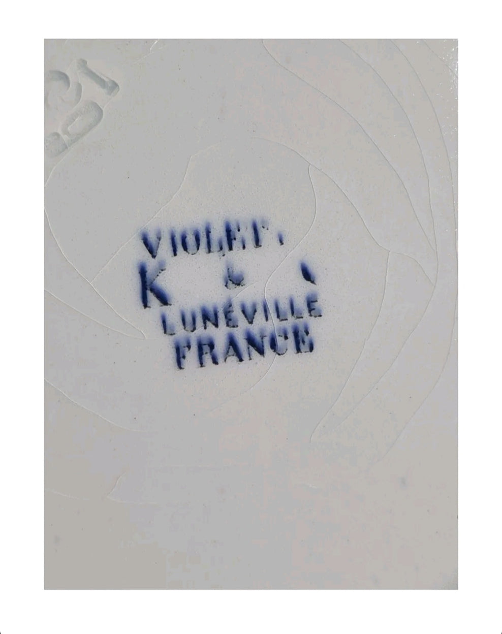 Oddly Darling Vintage ceramic plate base showing the blue Violet pattern maker's mark from Lunéville, France.