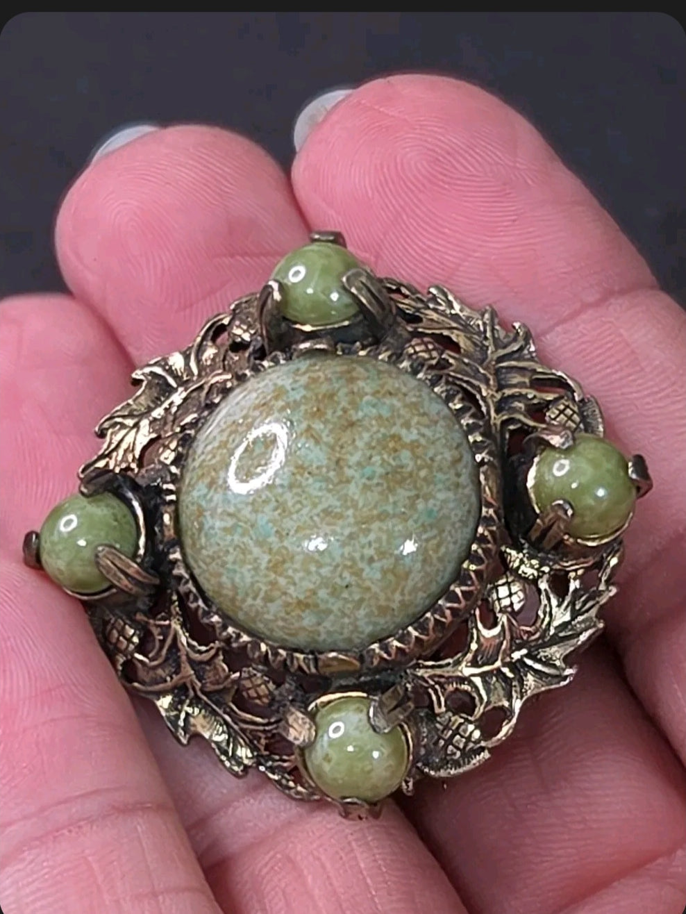 Oddly Darling Vintage Miracle brooch with sage green mottled cabochon stones and antique gold leaf and acorn filigree