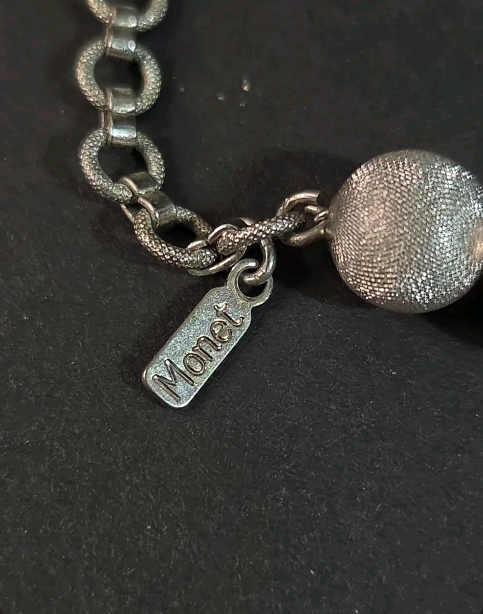 Oddly Darling Vintage Monet silver-tone textured bead necklace with signature brand tag and chain link detail