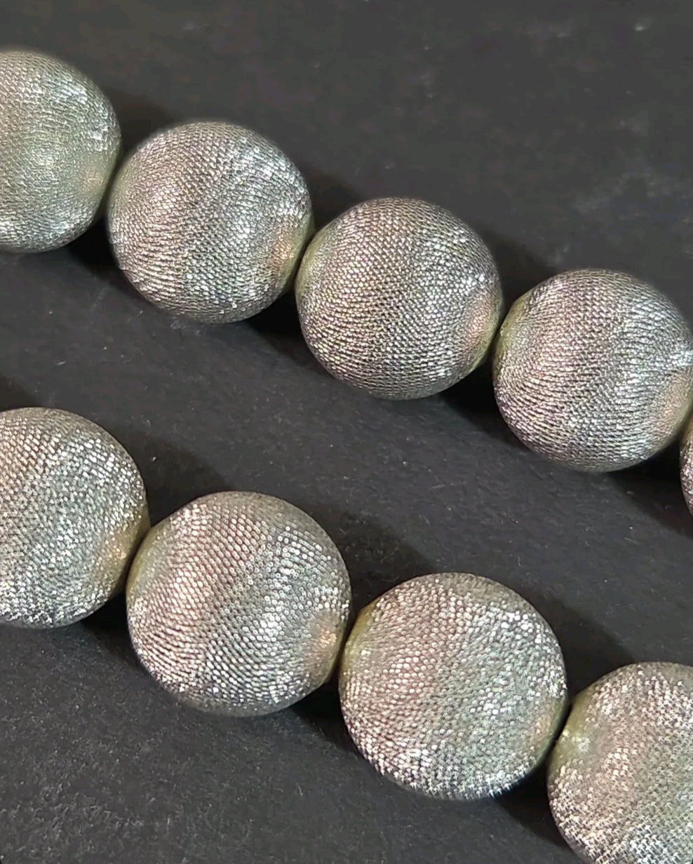 Oddly Darling Vintage Monet silver-tone statement necklace featuring textured spherical beads with a brushed finish.