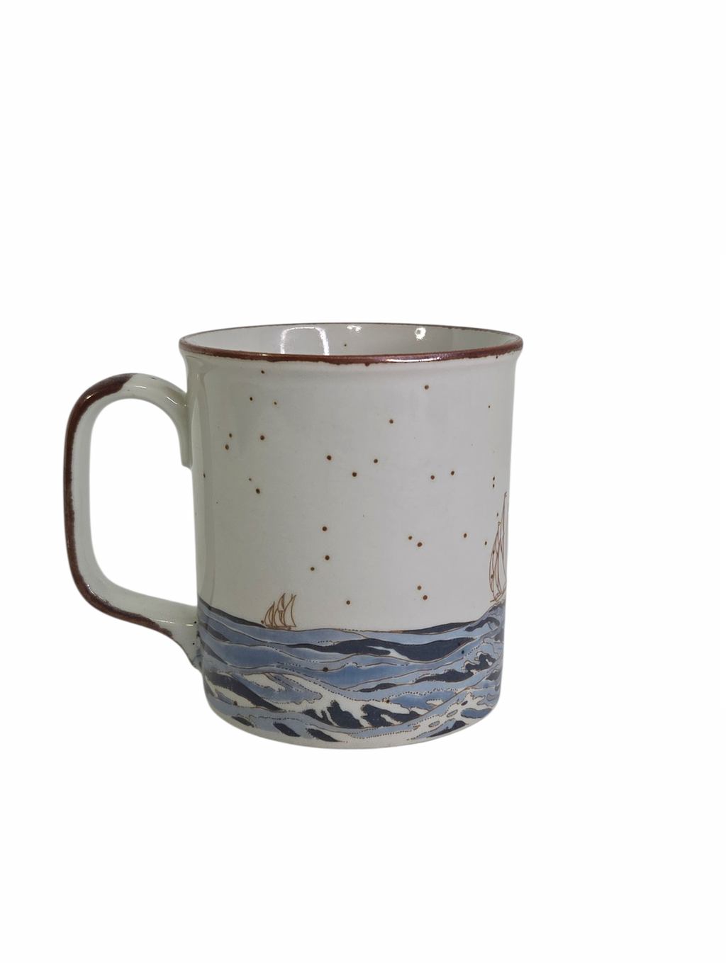 Oddly Darling Vintage ceramic coffee mug with a nautical sailboat illustration, speckled off-white finish, and brown rim