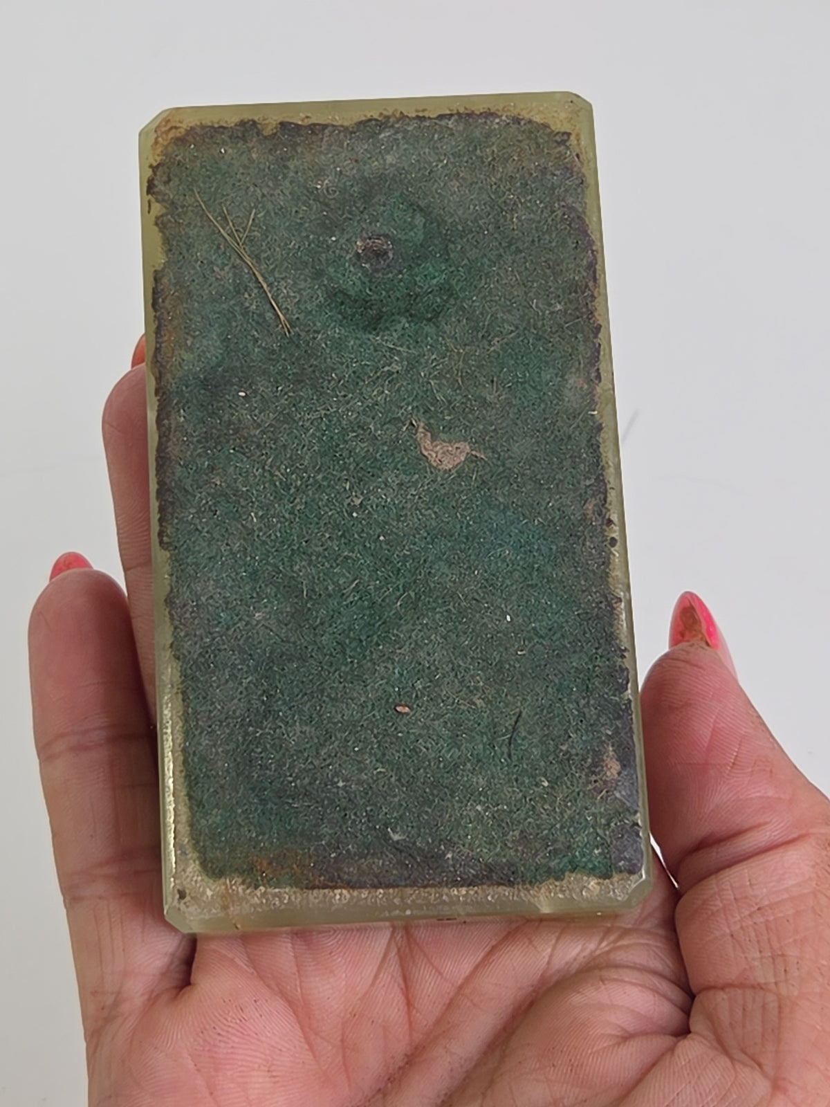 Oddly Darling Vintage green onyx trinket tray base with protective felt backing held in a hand
