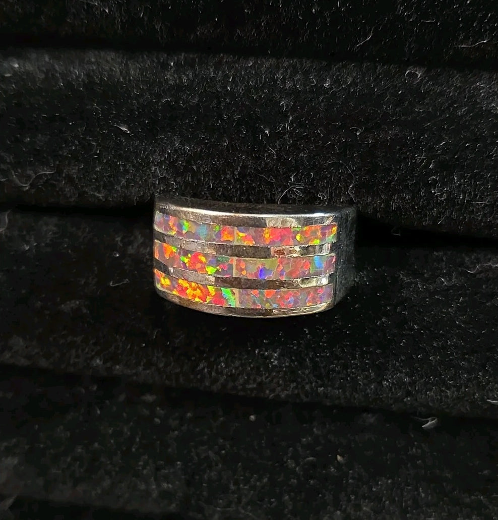 Oddly Darling Vintage wide band ring featuring three horizontal channels of iridescent multi-colored opal inlay.
