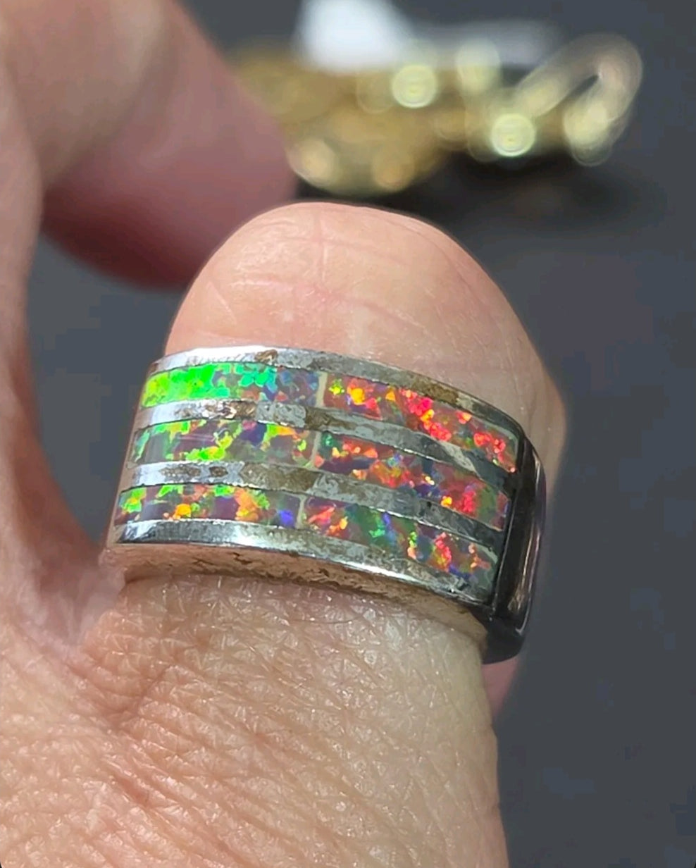 Oddly Darling Vintage wide band ring featuring three horizontal channels of iridescent multi-colored opal inlay
